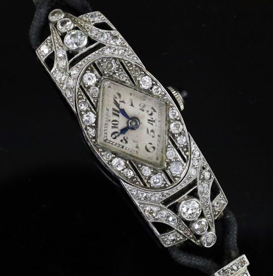 A ladys 1930s/1940s platinum? and diamond set cocktail watch,